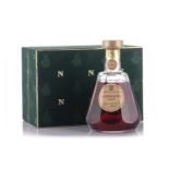 A Baccarat glass decanter containing Napoleon Courvoisier Cognac, limited edition, numbered