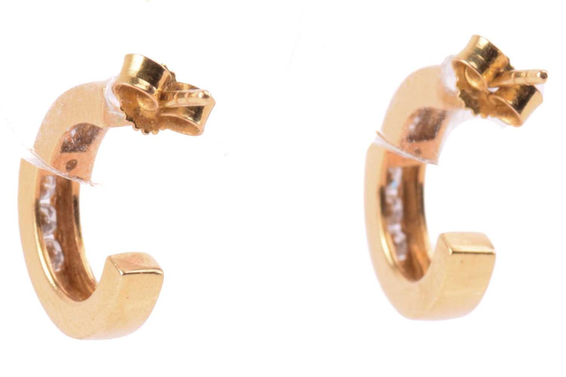 Two pairs of diamond-set hoop earrings in 18ct yellow gold; the first channel-set with diamond - Image 7 of 7