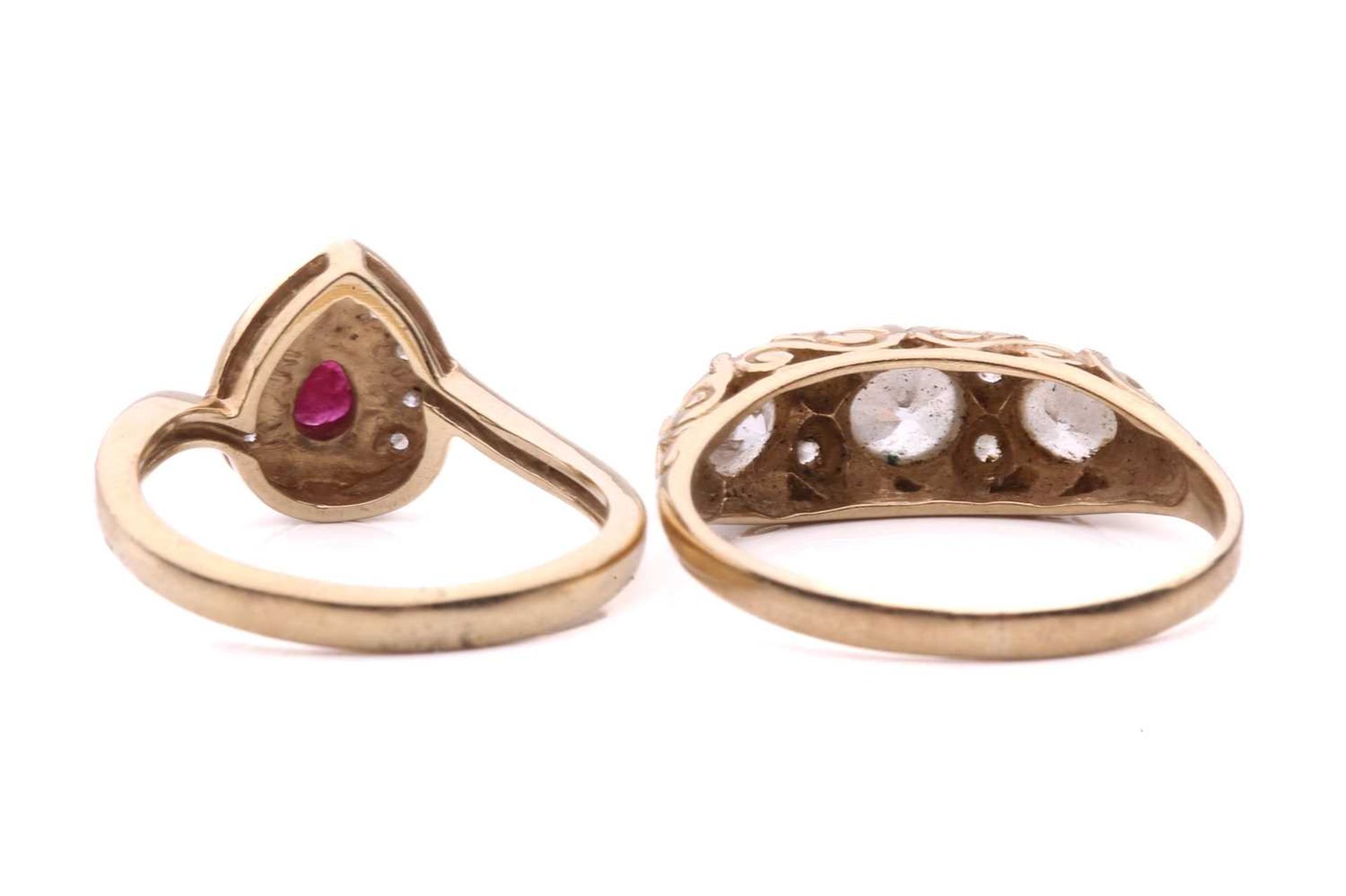 Two gem-set dress rings; the ruby and diamond cluster ring, set with a pear shape ruby surrounded by - Image 4 of 4
