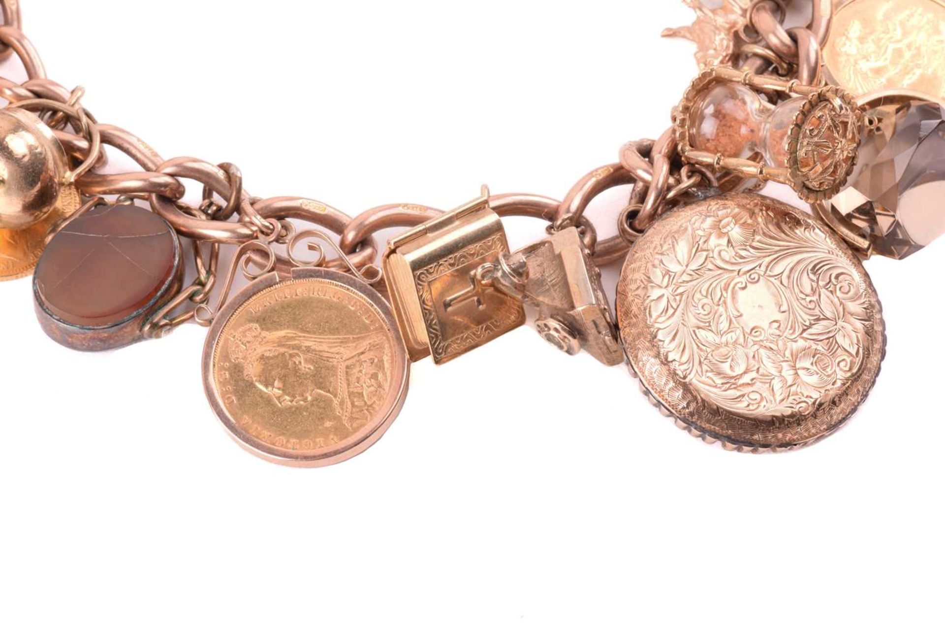 A double Albert chain charm bracelet in 9ct rose gold, constituted of a heavy curb link terminated - Image 3 of 4