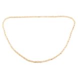 A Modernism fancy link necklace in 18ct yellow gold, composed of textured links with bead details,