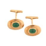 A pair of emerald cufflinks, each set with an oval cabochon emerald, with Italian control marks