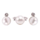 A pair of pearl and diamond earrings and a ring en suite; the central single freshwater pearl