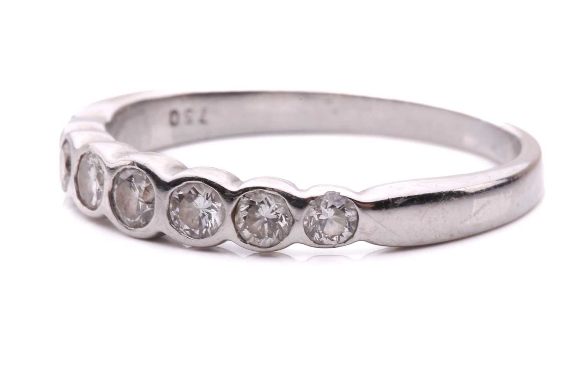 A diamond seven stone half hoop eternity ring, featuring a row of round brilliant cut diamonds - Image 2 of 4