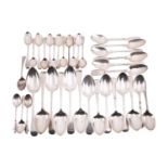 A collection of varying silver spoons, including a set of six Walker & Hall silver Old English