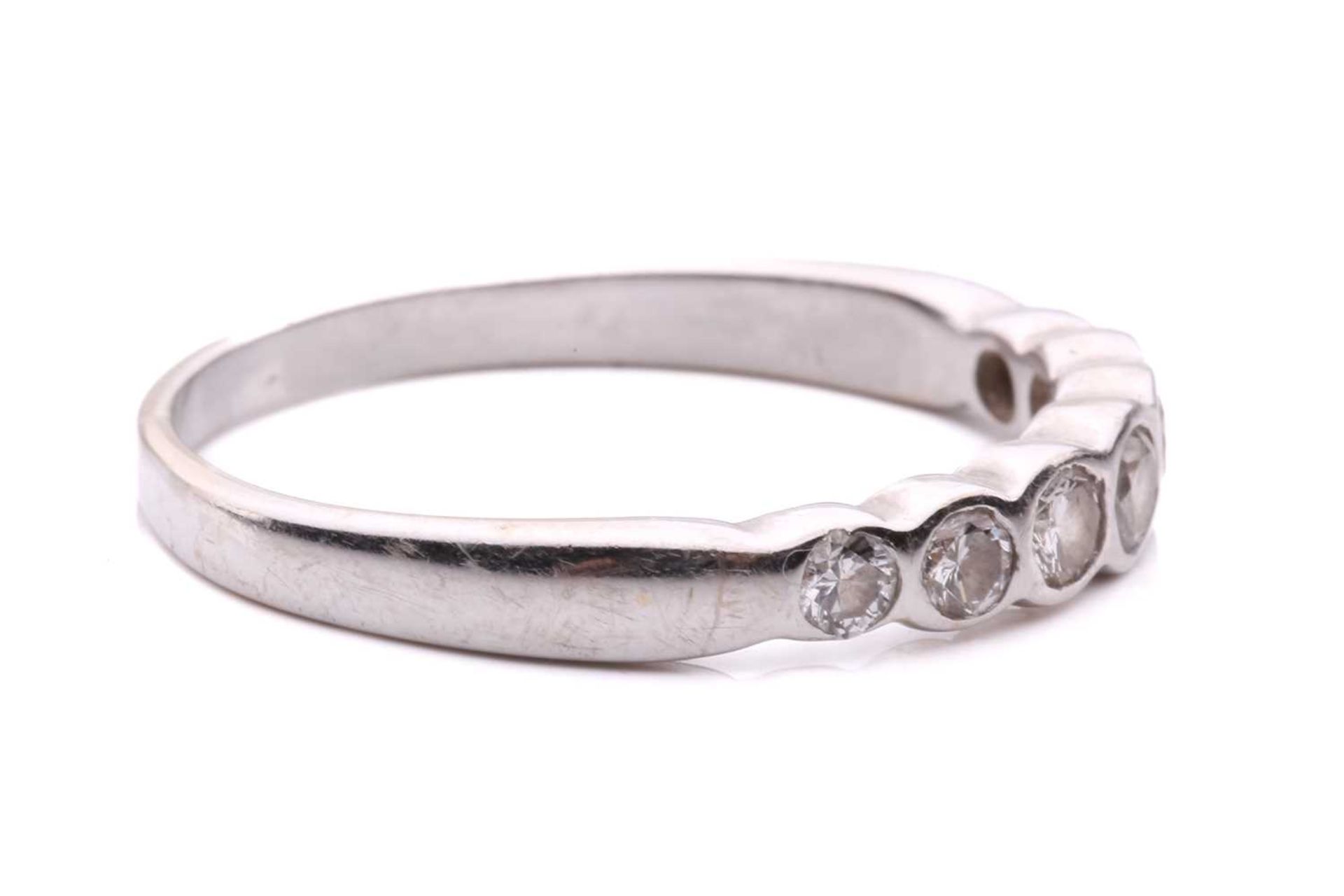 A diamond seven stone half hoop eternity ring, featuring a row of round brilliant cut diamonds - Image 3 of 4