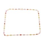 A gem-set harlequin necklace, open-back links set with oval-cut gemstones of 5.8 mm, alternating