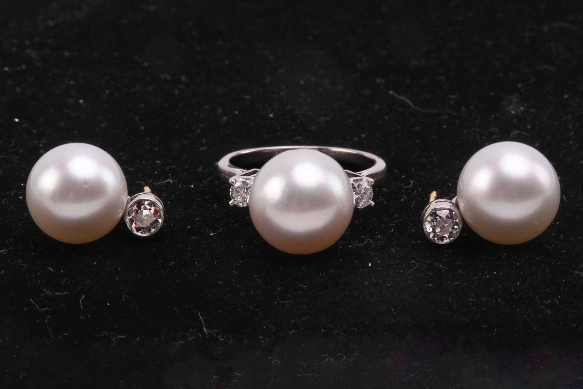 A pair of pearl and diamond earrings and a ring en suite; the central single freshwater pearl - Image 2 of 7