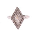 An Art Deco diamond dress ring, circa 1920, the navette-shaped cluster with a central kite shape