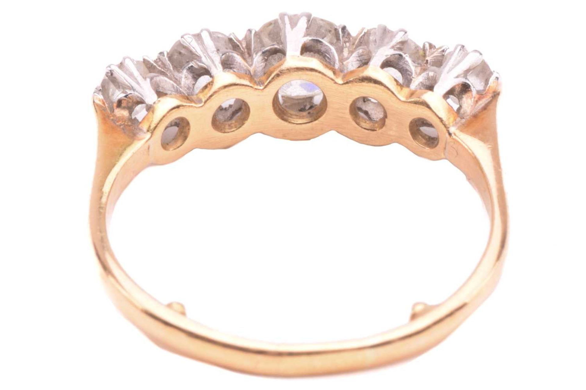 A diamond five stone ring, set with a graduated row of cushion shape old cut diamonds with a total - Image 5 of 5