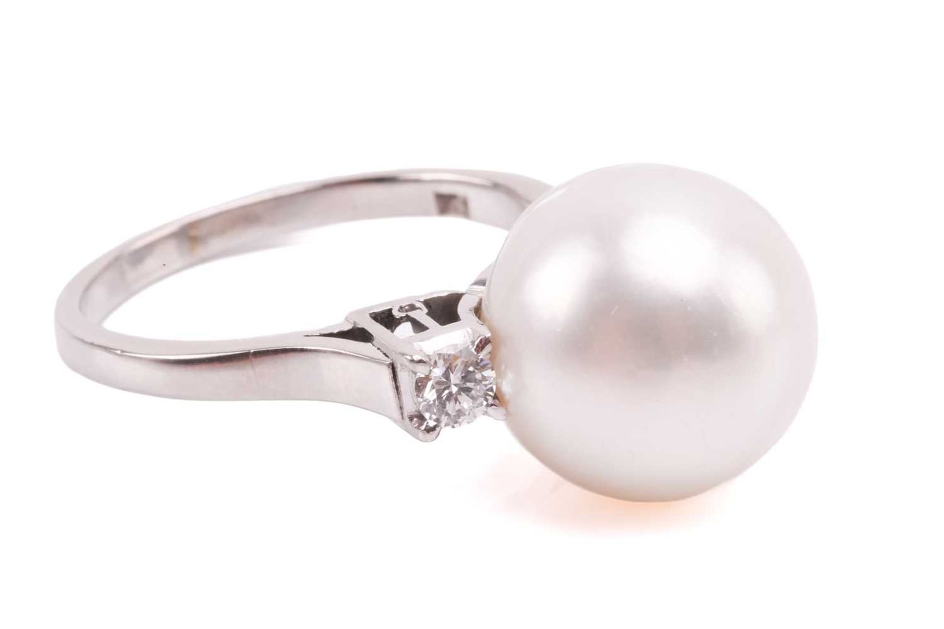 A pair of pearl and diamond earrings and a ring en suite; the central single freshwater pearl - Image 7 of 7