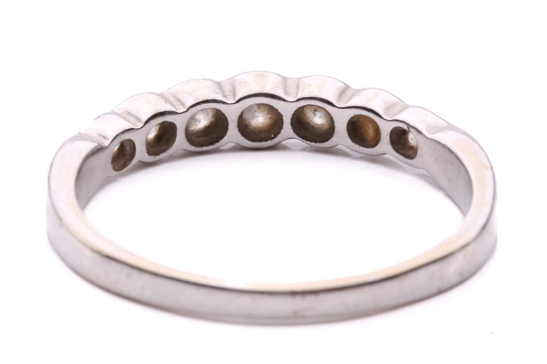 A diamond seven stone half hoop eternity ring, featuring a row of round brilliant cut diamonds - Image 4 of 4