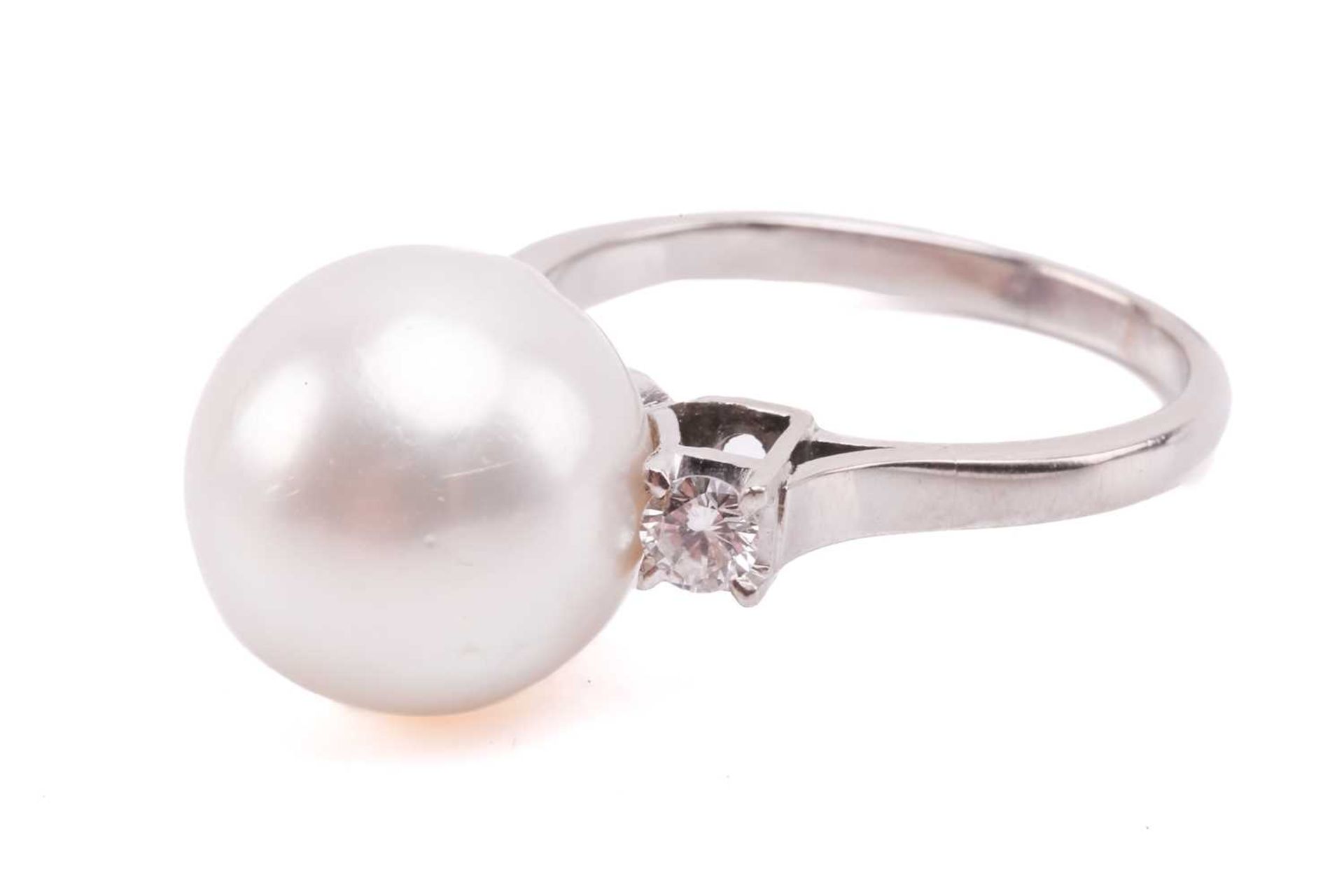 A pair of pearl and diamond earrings and a ring en suite; the central single freshwater pearl - Image 6 of 7