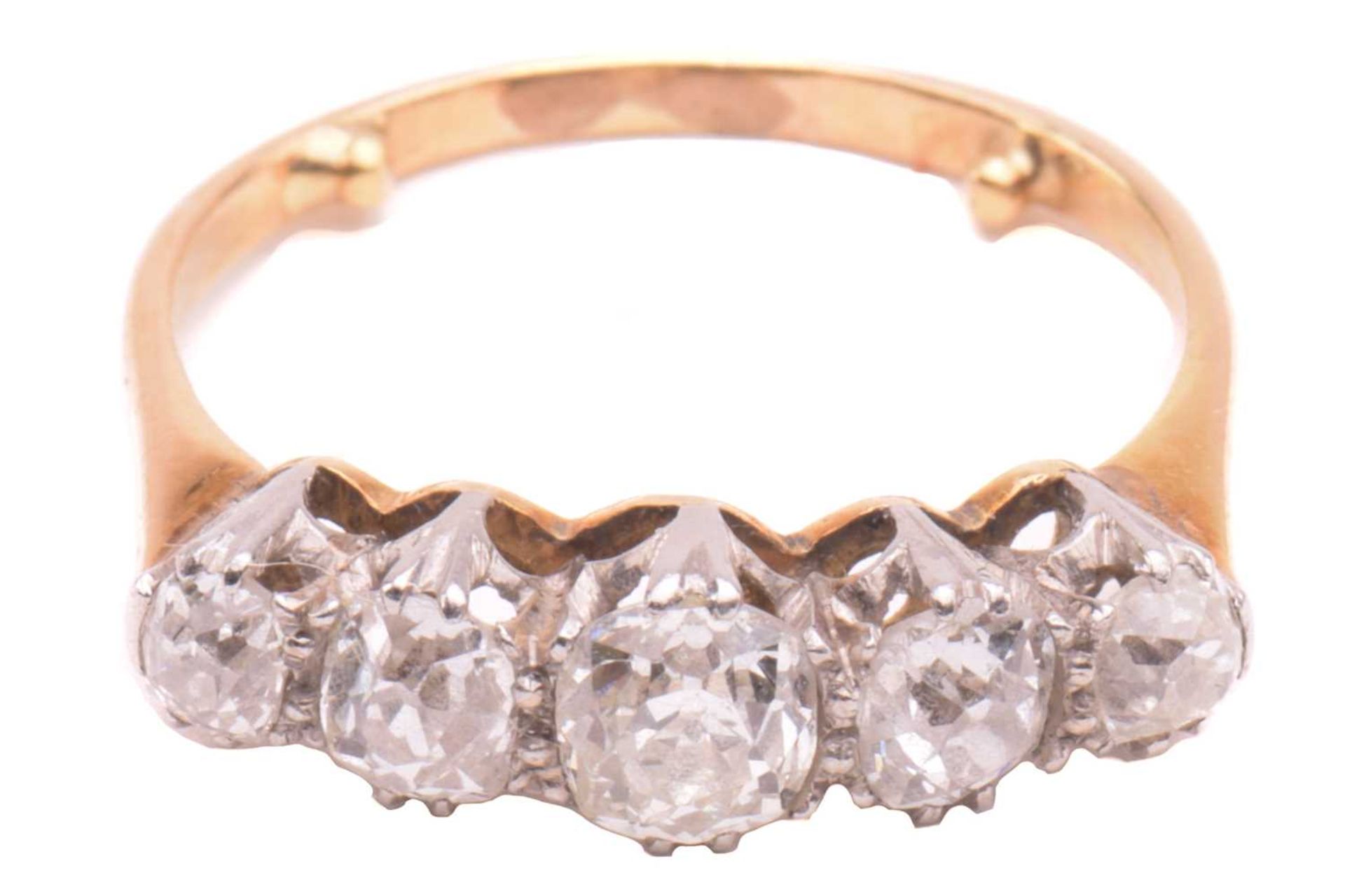 A diamond five stone ring, set with a graduated row of cushion shape old cut diamonds with a total - Image 2 of 5