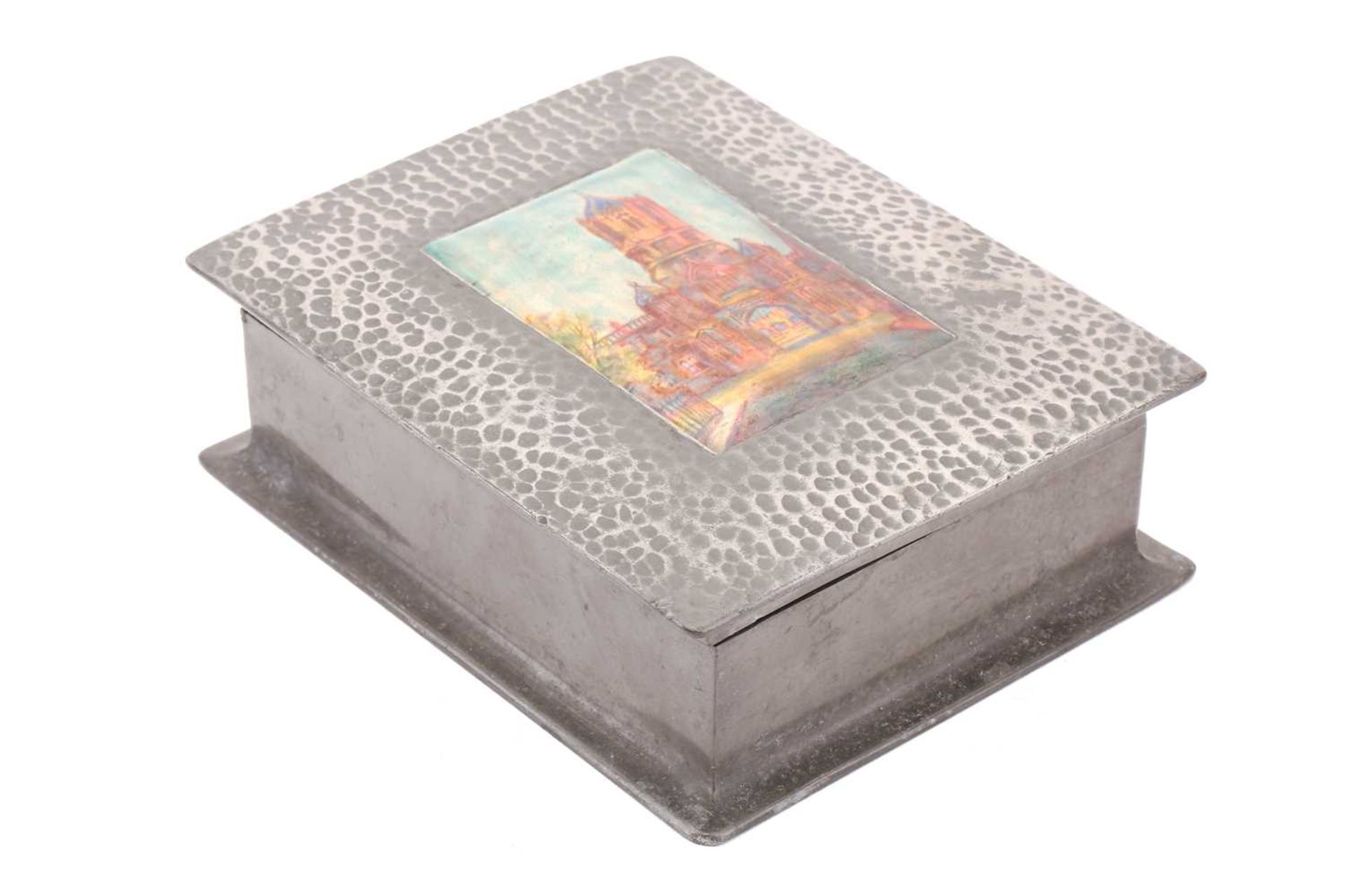 A Liberty & Co (?) model 083 hammered pewter and hard enamel table box, the hinged cover set with