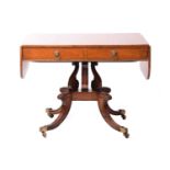 A possibly Scottish George IV rosewood crossbanded mahogany sofa table fitted with two deep frieze