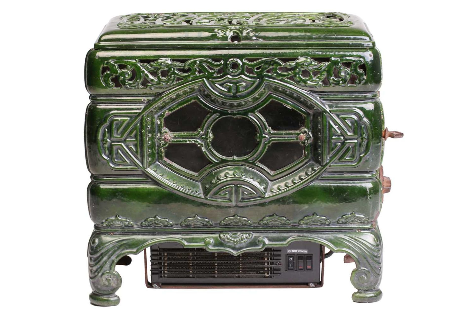 A Faure Revin 'Mah Jong' green enamelled stove, converted into an electric heater, 50 cm wide, 46 cm