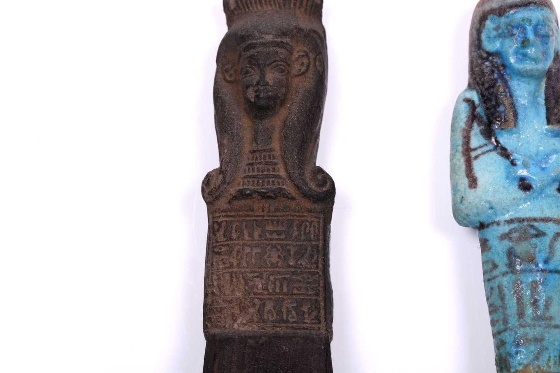 An Egyptian basalt-type Shabti with a hieroglyphic panel to the torso mounted in an old museum- - Image 5 of 9