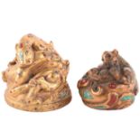 A Chinese gilt bronze Tang-style fighting tiger scroll weight set with polished hardstones, with