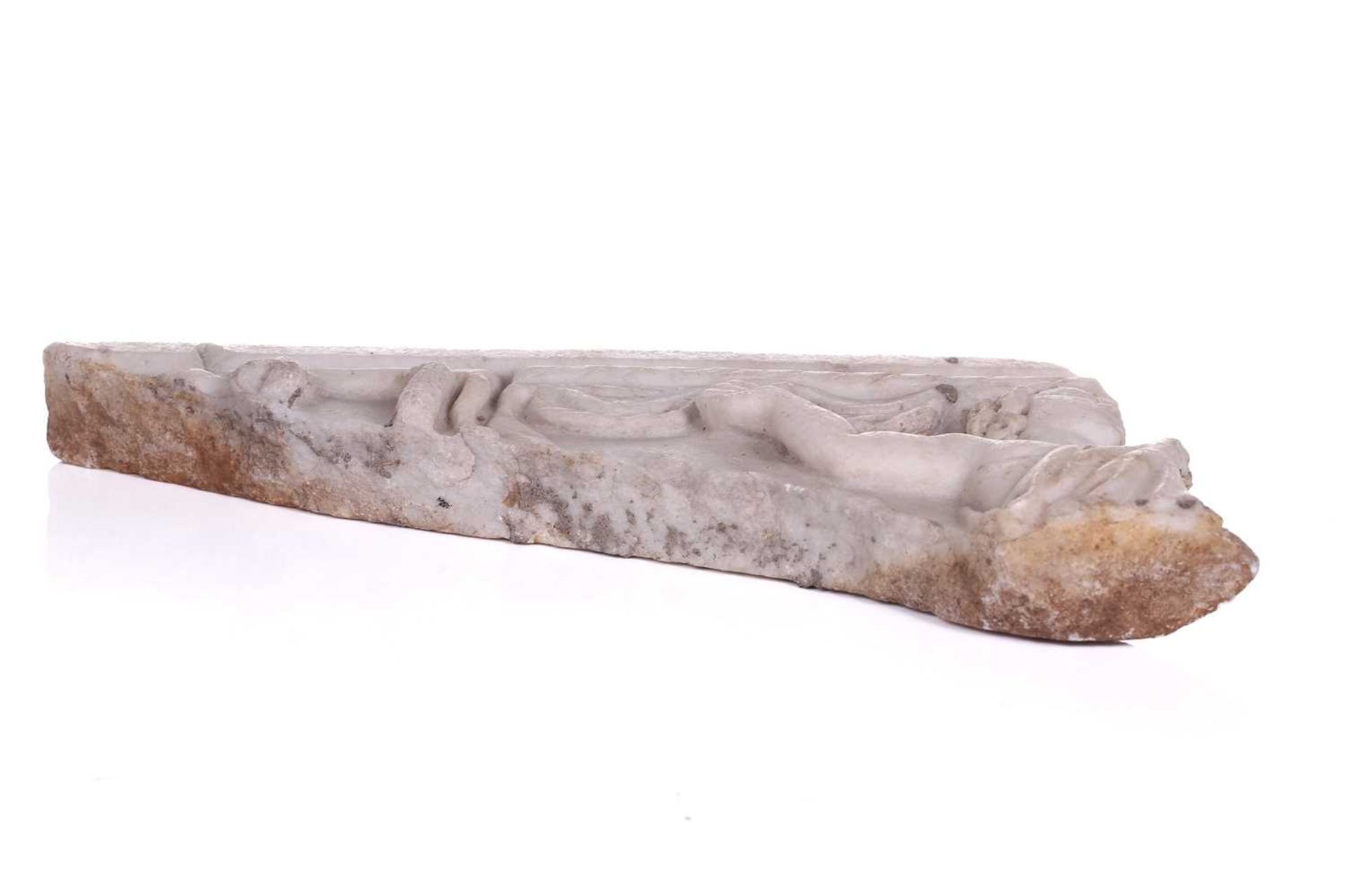 A Roman Marble fragment, 2nd/3rd century AD, possibly part of a sarcophagus, depicitng a youth in - Image 3 of 11