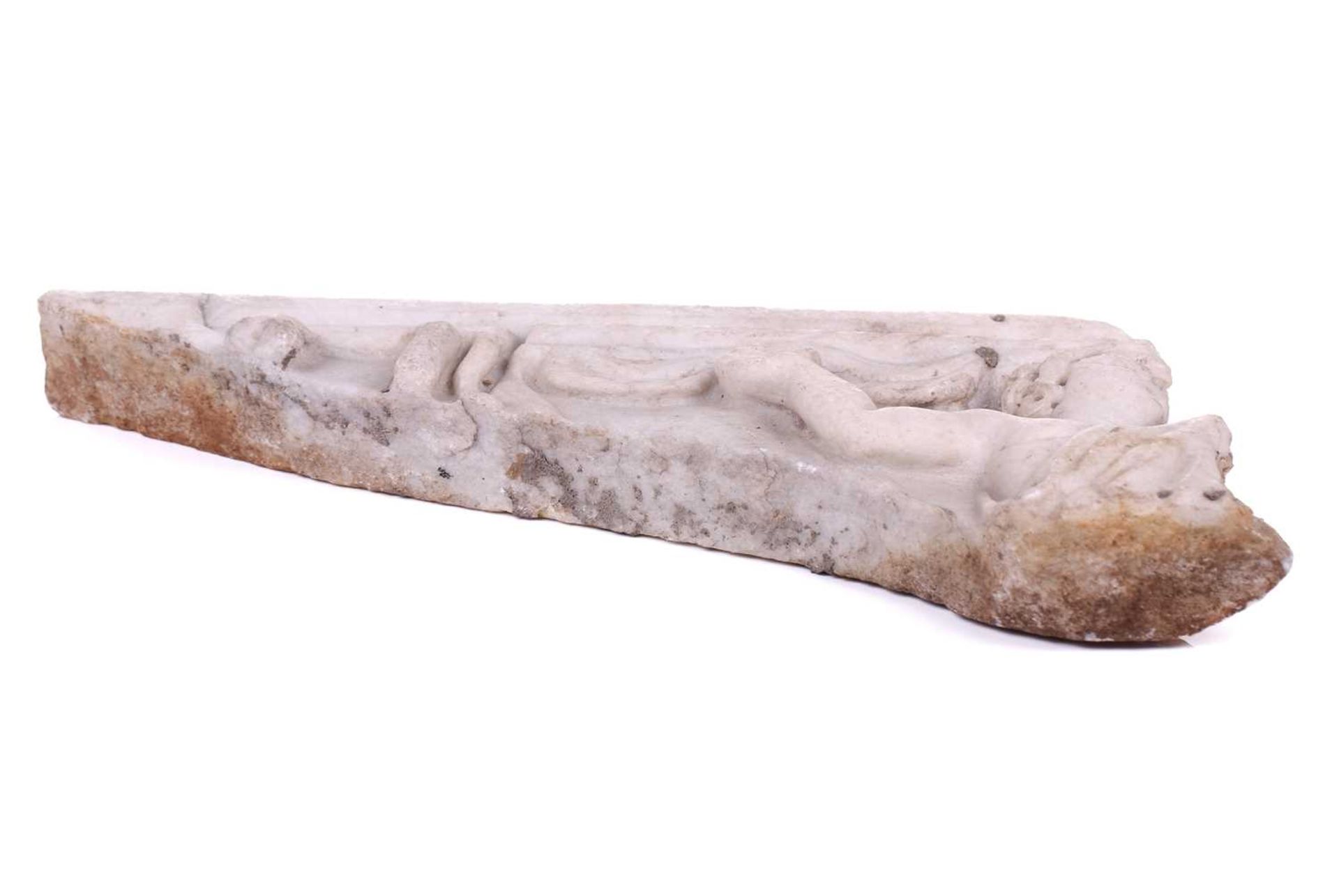 A Roman Marble fragment, 2nd/3rd century AD, possibly part of a sarcophagus, depicitng a youth in - Image 2 of 11
