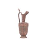 A 'Khorosan' style ewer, probaly North east Iran, of fluted lobed form, with stylised Islamic