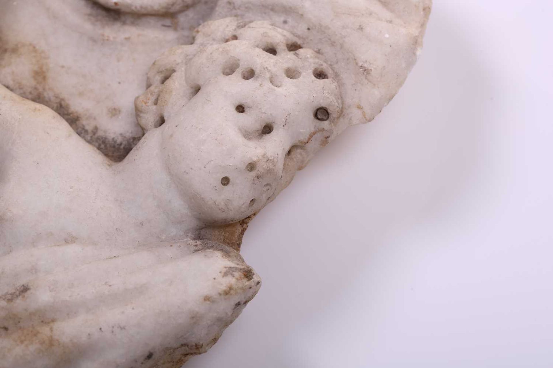 A Roman Marble fragment, 2nd/3rd century AD, possibly part of a sarcophagus, depicitng a youth in - Image 6 of 11