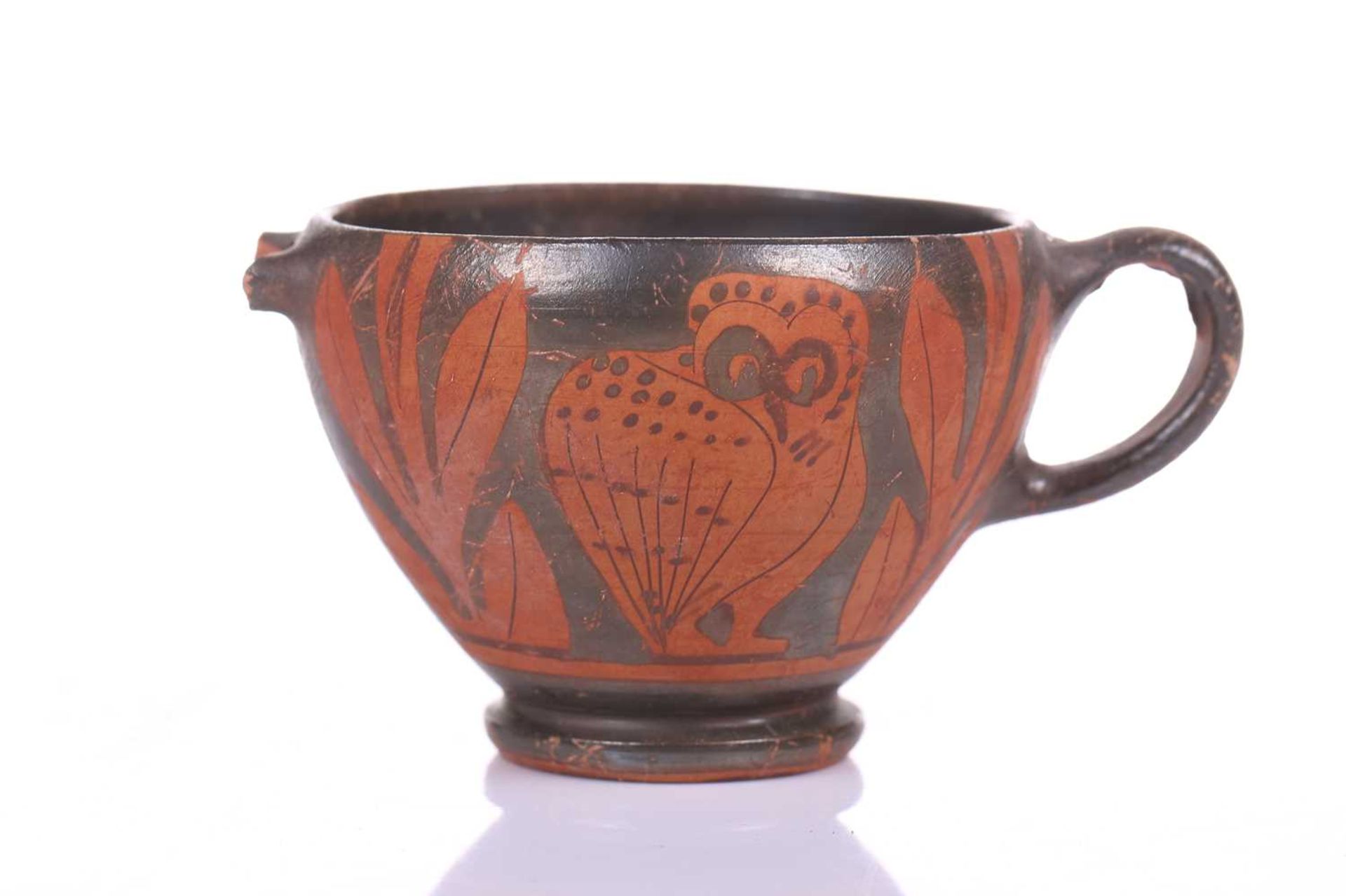 An Athenian-style ritual cup, 4th century BC or later, decorated with the "Owl of Athena" amidst - Image 2 of 8