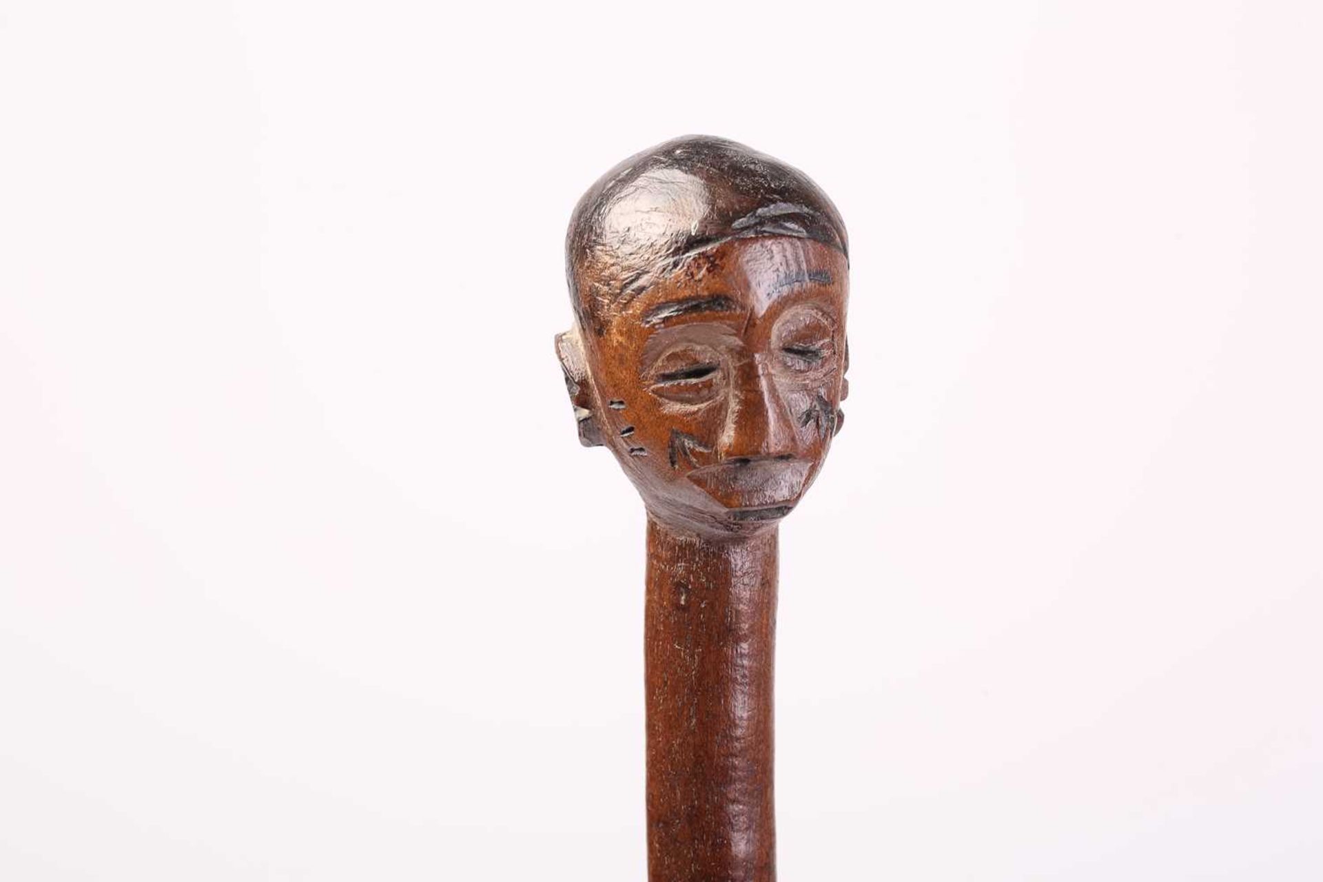 A collection of five African carved wood tribal staffs including two possibly Ovimbundu examples - Image 11 of 12