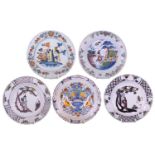 A group of five various English delft polychrome plates, including a Bristol example, circa 1735