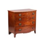An early 19th-century mahogany bowfront chest of drawers, with boxwood stringing, the four graduated