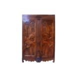 A large French provincial 'Grenoble Walnut' two-door armoire, late 18th century, with later