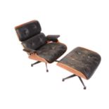 After a design by Charles & Ray Eames, a lounge chair and ottoman (No. 670 and 671), with mahogany