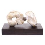 Manner of Henry Moore (1898-1986), reclining figure, a plaster maquette on a wooden plinth, 11 cm