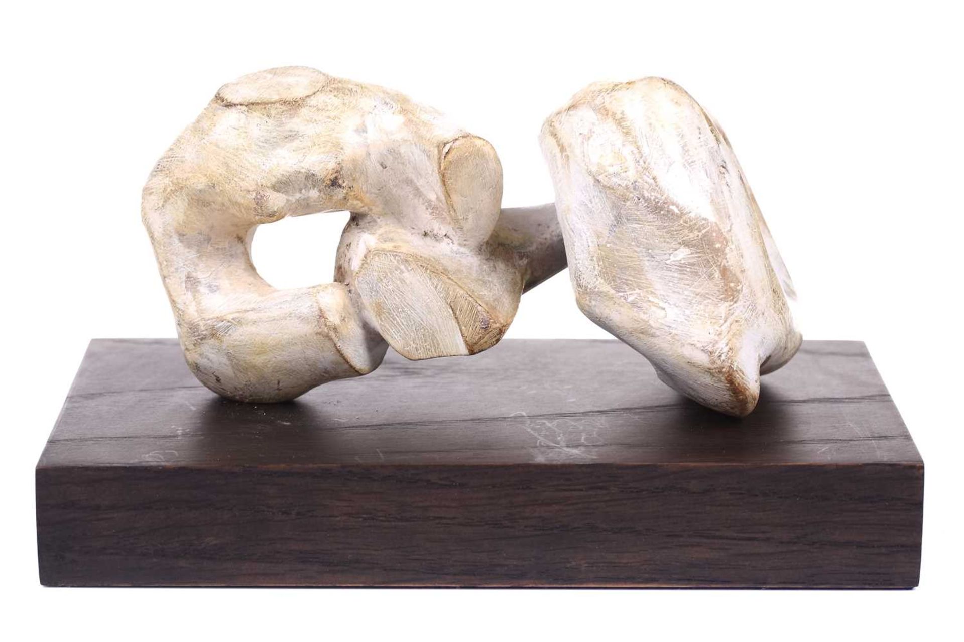 Manner of Henry Moore (1898-1986), reclining figure, a plaster maquette on a wooden plinth, 11 cm