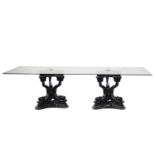 A large rectangular 'Hollywood Regency' vintage plate glass dining table, supported by a pair of