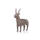 An Islamic gilt-bronze figure of a deer, probably Qajar, 19th century, realistically modelled,