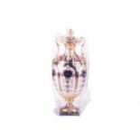 A Royal Crown Derby "Old Imari" bone china globular two-handled urn and cover, bearing the date mark