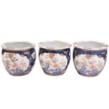 A series of three large matching Chinese porcelain (Macao?) circular fishbowls of heavy baluster