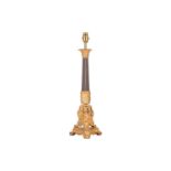 A gilt and patinated metal table lamp, 20th century, with composite capital and reeded shaft, the