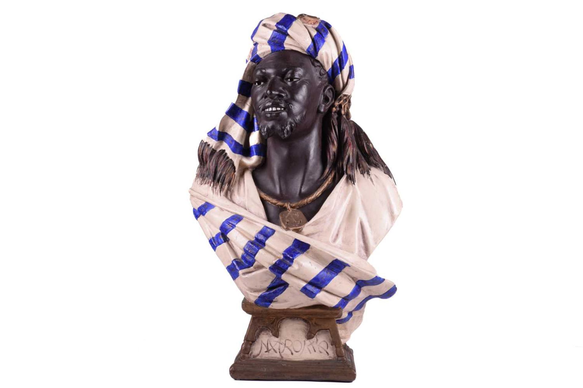 A contemporary Goldscheider-style composition bust titled 'Marokko' of a Berber tribesman in