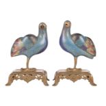 A pair of Chinese cloisonne enamel figural censers in the form of a pair of Chinese painted quail,