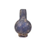 An opaque blue Roman glass vase, probably 3rd-5th century AD or middle eastern origin, of sqaut