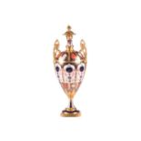 A large and impressive Royal Crown Derby "Old Imari" pattern (1128) bone china two-handled urn and