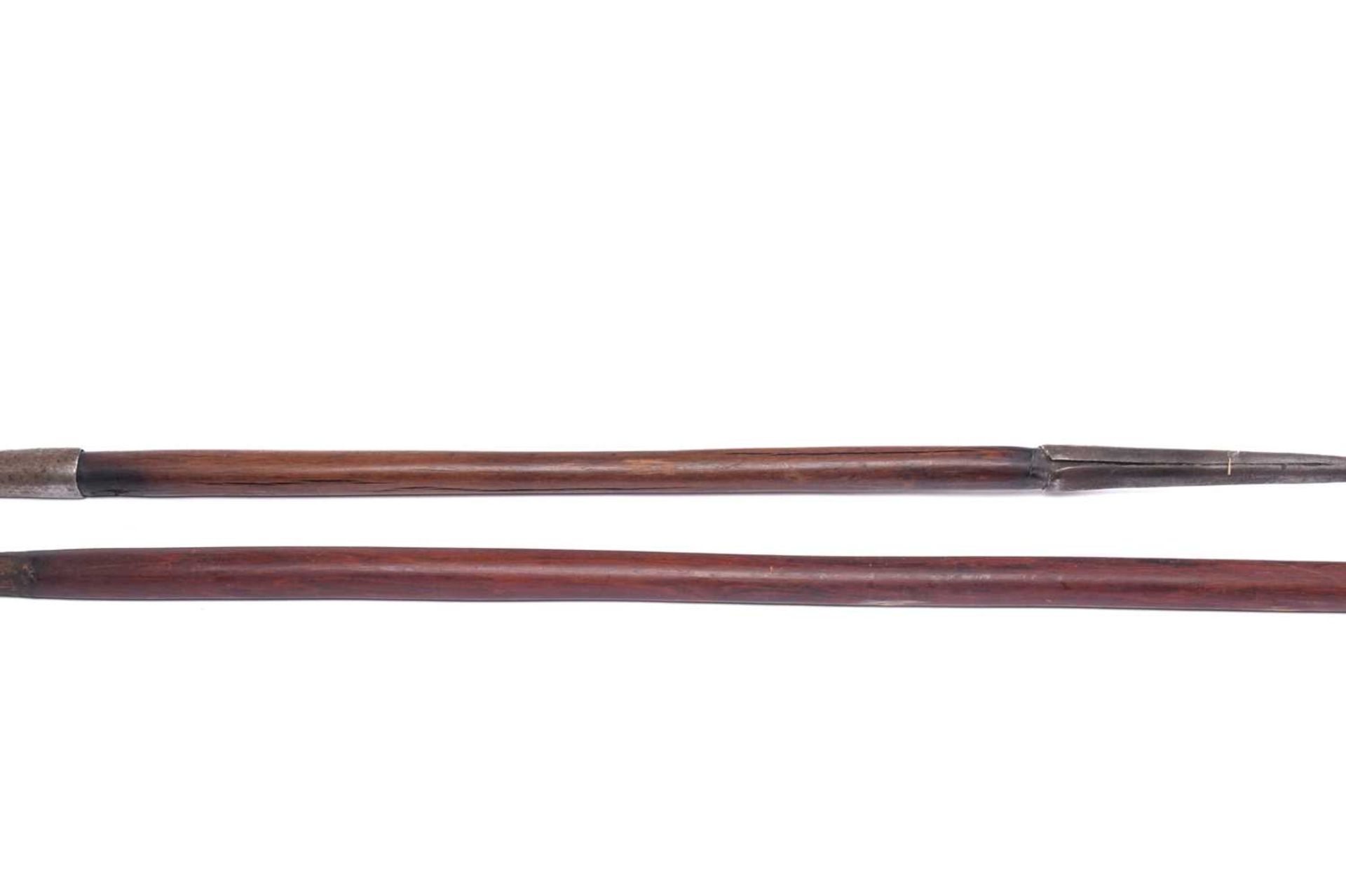 A large Maasai double-ended hunting spear, 20th century, with ridged double-sided iron blade and - Image 7 of 9
