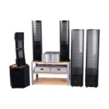 A Martin Logan theatre audio system including a pair of ESL "Summit" speakers 32 cm wide x 150 cm