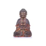 A Sino-Tibetan gilt metal and polychrome Buddha, probably 19th century, depicted seated and cross-