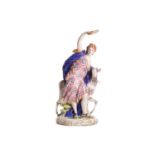 An 18th-century Derby porcelain figure of a triumphant Diana the huntress accompanied by an