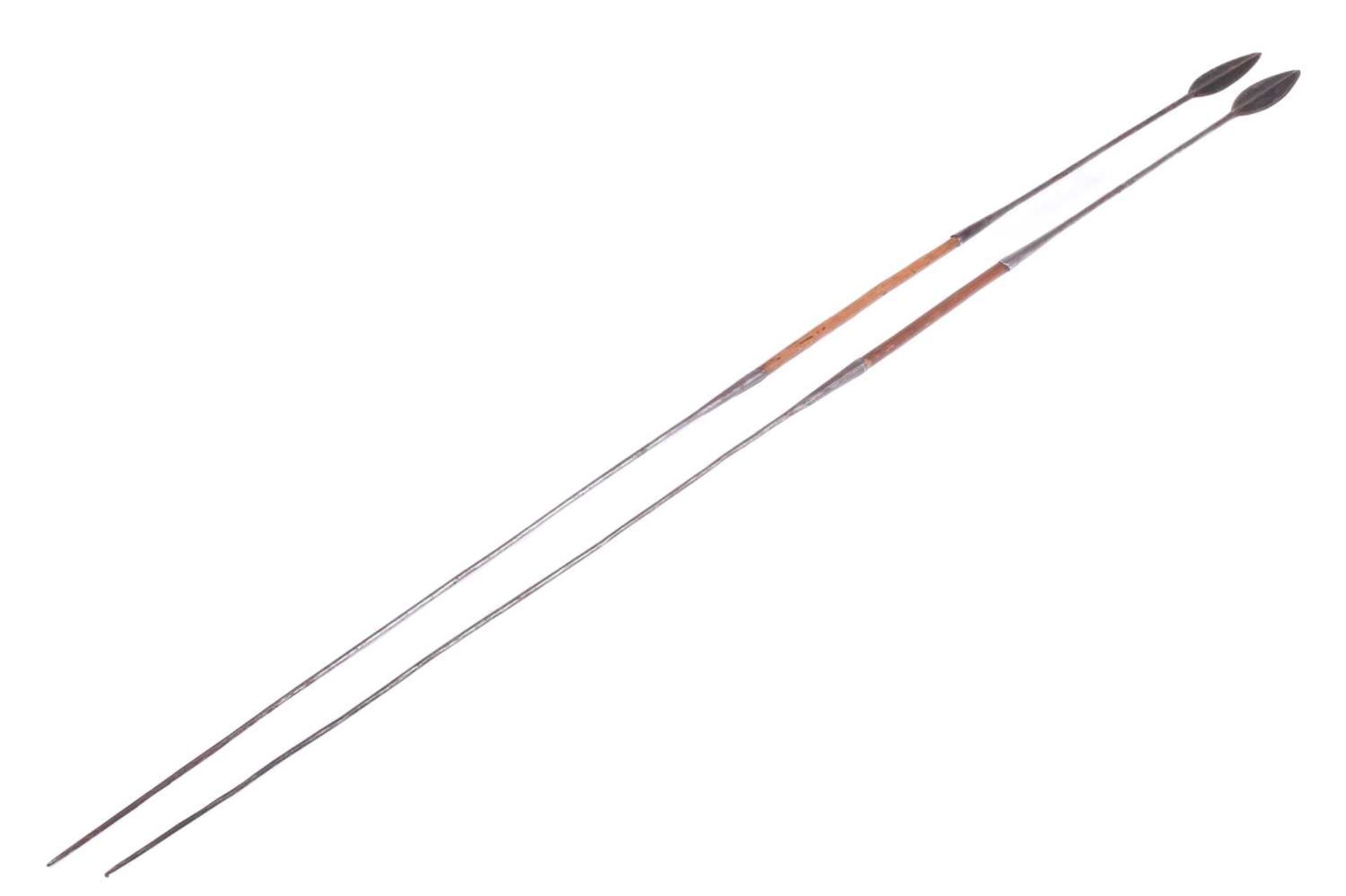 A large Maasai double-ended hunting spear, 20th century, with a ridged double-sided iron blade and - Image 6 of 7