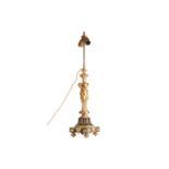 An Empire style ormolu table lamp, column formed of three cherubs on a square green marble base,